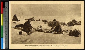 Missionary fathers eating a meal on a frozen plain, Canada, ca.1920-1940