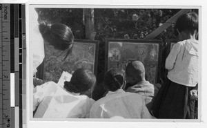 Catechumens looking at Christian doctrine pictures, Chinnampo, Korea, September 1938