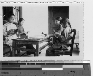 Children making Christmas cards at the orphanage at Luoding, China, 1935