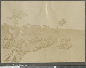 Students getting exam marks, Central province, Kenya, ca.1920