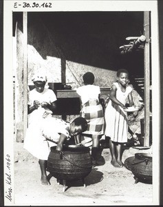 Manyemen. Girls preparing food in the Hospital kitchen