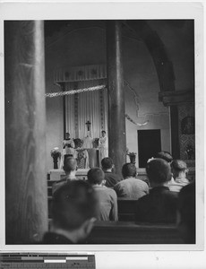 Maryknoll priests on the altar at Wuzhou, China, 1949