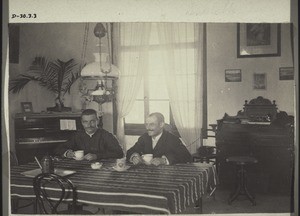 The missionaries Schulze and Deyle in their living-room