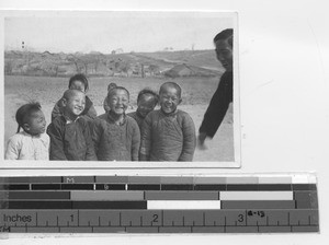 A group of happy children at Xinbin, China, 1935