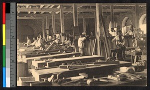 Students working in a carpentry shop, Stanleyville, Congo, ca.1920-1940