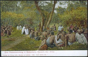 African men gathering under a tree, Machame, Tanzania, 1904