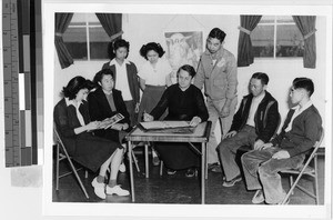 Fr. Leo Steinbach with a group at Japanese Relocation Camp, Manzanar, California, ca. 1942