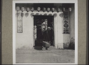 A non-christian girls' school in China. The cook is going shopping with her basket