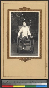 Young woman in wheelchair, China, 1932