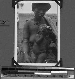 Xhosa woman is feeding her baby, Baziya, South Africa East