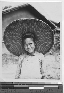 An helpful orphan girl at Luoding, China, 1927