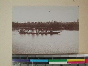 Crossing the river in a canoe, Ambodisiny, Madagascar, 1901