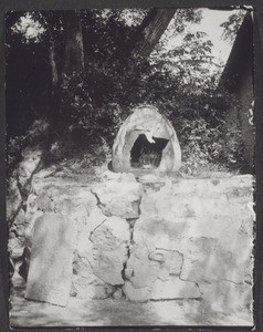 A little field temple in a broken jug