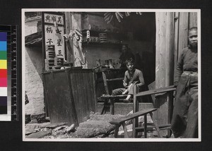 Portrait of carpenter at work, Ningbo, China, ca. 1937