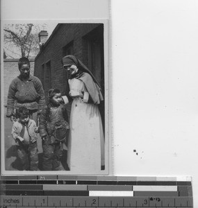 Sister Maria at the dispensary at Fushun, China, 1941