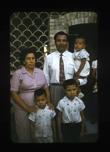 Family outside their home