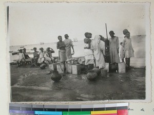 Women waiting at the harbour, Toliara, Madagascar, 1937