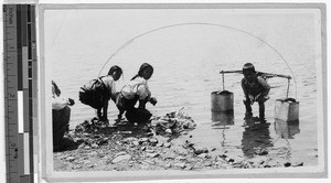 Three children working by Yalu River, Shingishu, Korea, 1925