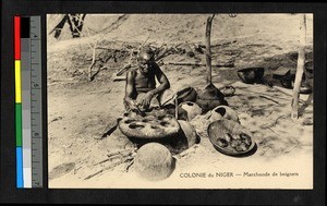 Woman preparing beignets, Nigeria, ca.1920-1940