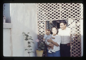 Family outside their home