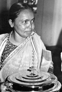 Bangladesh Lutheran Church/BLC, 1981. Naomi, employee of the clinic, carrying "Church silver"