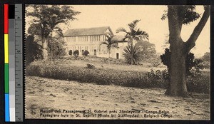 Mission building standing on the crest of a low hill, Stanleyville, Congo, ca.1920-1940