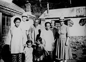 Tagusan, 1930. Helen Madsen and Astrid Poulsen are seen in the photograph with others. Teacher