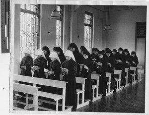 Sisters pray in chapel at Jiangmen, China, 1947