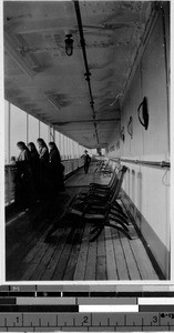 Four Maryknoll Sisters standing on a ship deck, Yokohama, Japan, December 11, 1925