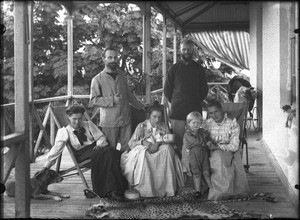 Group of Swiss missionaries on the porch of the mission house in Antioka, Mozambique, 1902