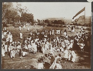 Crowd of people with flag, Tanzania