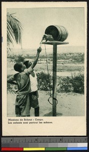 Children play with a monkey, Congo, ca.1920-1940