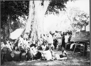 Schoolchildren at a village square, Gonja, Tanzania, ca. 1927-1938