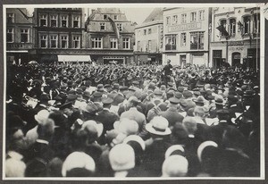 Brass band and crowd of people on a square, Germany