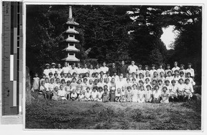 Group portrait of a Maryknoll priest with Japanese children, Japan, ca. 1938