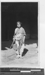 A woman begging at Beijing, China, 1936