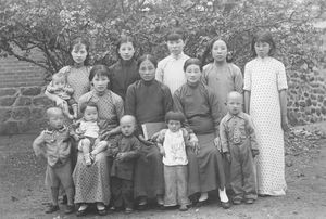 A group of new baptized Pentecost in Port Arthur church, 1940. Behind the Picture is written th