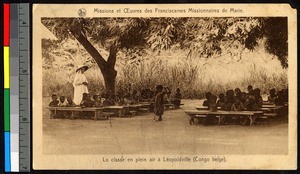 Missionary sister teaching children outdoors, Congo, ca.1920-1940