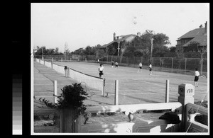 Women students playing tennis on courts of the Women's College, Yenching University, Beijing, China, May 1936