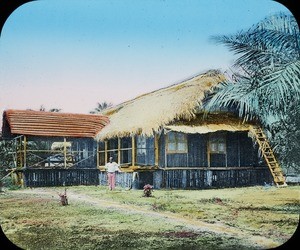 Man outside mission house, Congo, ca. 1920-1930