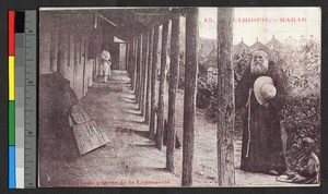 Missionary father standing before portico at leprosarium, Ethiopia, ca.1920-1940