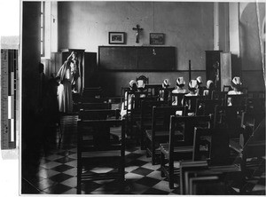 Maryknoll Sister teaching a nursing class at St. Paul's Hospital, Manila, Philippines, May 12, 1928