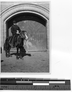 Father Mullen on a pony at Fushun, China, 1929