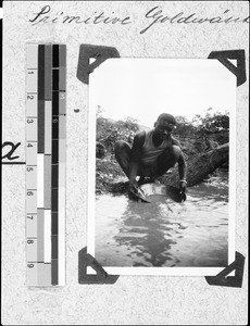 An African gold washer at work, Nyasa, Tanzania, 1936