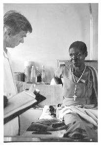 ELCT, Karagwe Diocese, Tanzania. Medical Missionary Dr Børge Buch with a patient at Nyakahanga