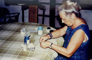 East Jeypore, Gunupur, India. Missionary Kæthe Andersen prepares medicine for distribution