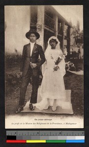 Newlyweds standing for a photograph in European dress, Madagascar, ca.1920-1940