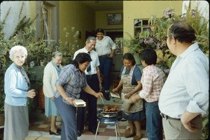 J.W. and Mildred Treat and Sarah Miller at a home