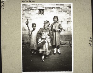 A non-christian great-grandmother with her great-graddaughters