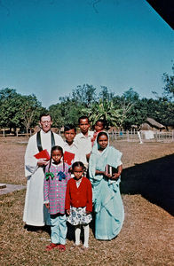 DSM Missionary, Rev. Jens Verner Olsen with church members. Was sent to NELC, North India, 1957